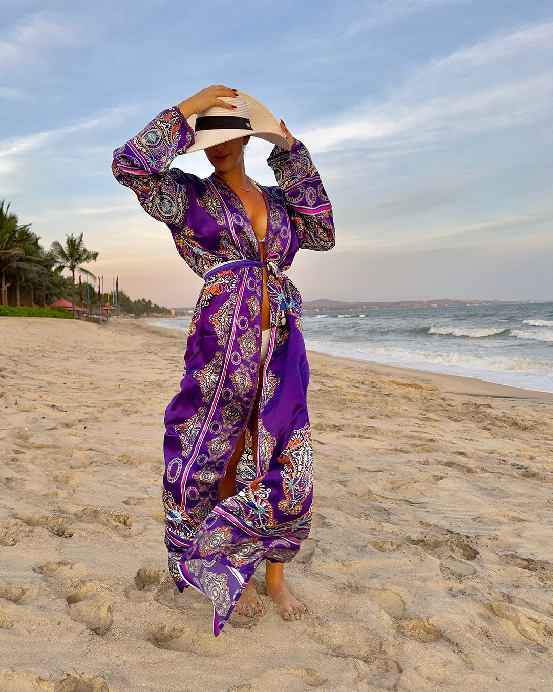 Elegant silk robe as a beach accessory