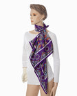 Silk scarf paired with a minimalist outfit